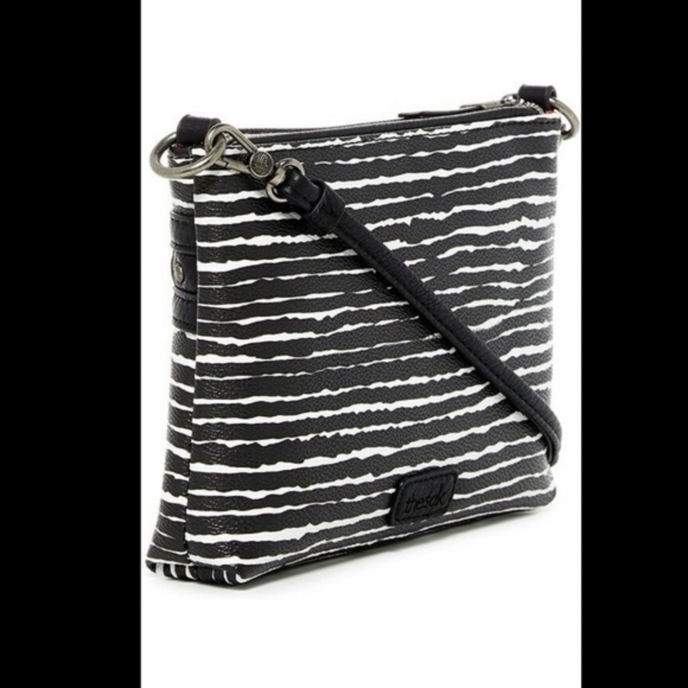 The Sak Hasley Mini Crossbody in moonlight ripple vegan leather